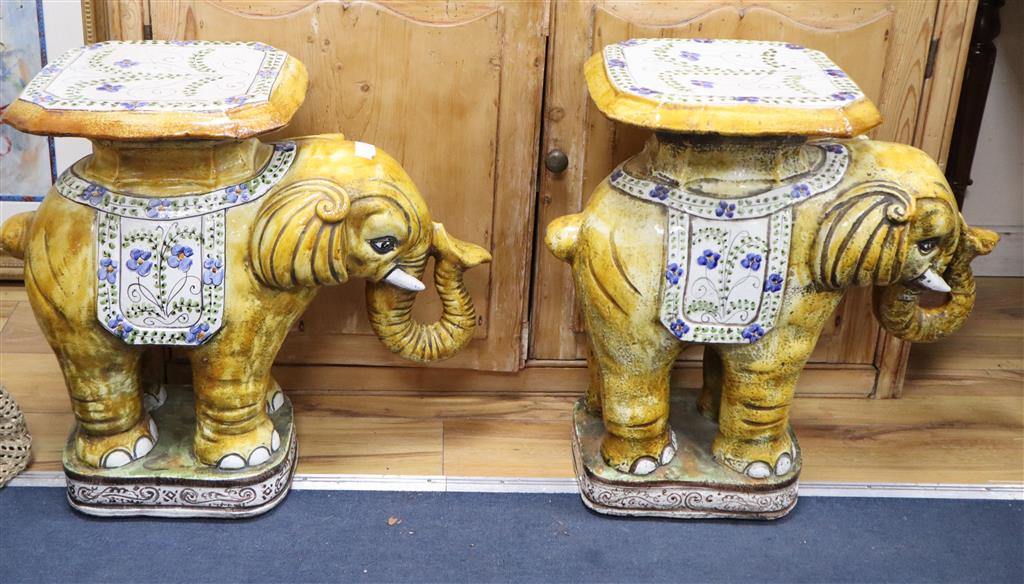 A pair of terracotta elephant garden seats